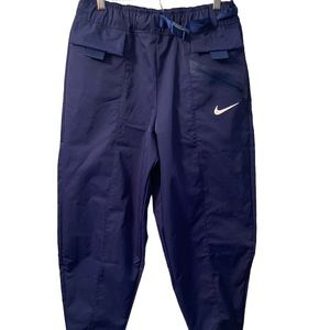 Nike DH9897 492 Women's Sz S Blue Sportswear Tech Pack Curve Woven Pants